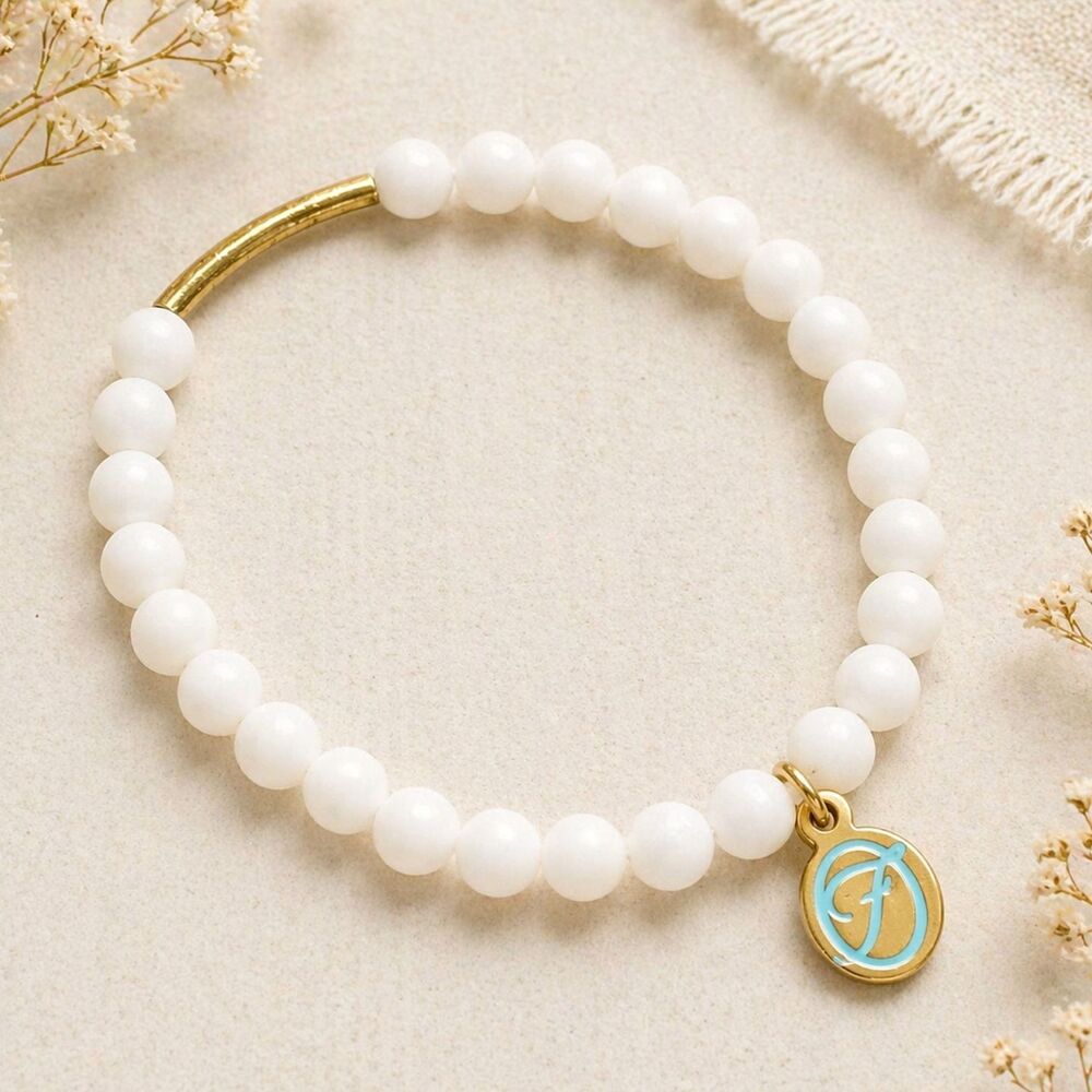 Signed Fabulina Faceted White Quartz Beaded and Gold Tone Stretch Bracelet
